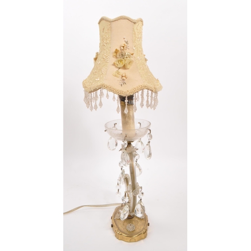 832 - A mid 20th century Ventana glass table lamp light. Having floral protruding shade, light fixing to t... 