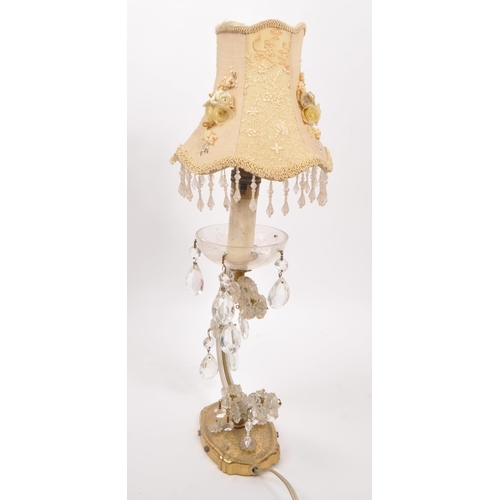 832 - A mid 20th century Ventana glass table lamp light. Having floral protruding shade, light fixing to t... 