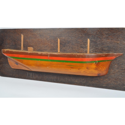 835 - A wooden plaque depicting model of boat / ship with writing underneath reading: ' Dido Built Hull 18... 