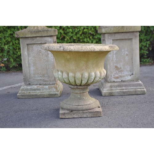 836 - A collection of three outdoor vintage 20th century reconstituted stone composite Campana garden urns... 