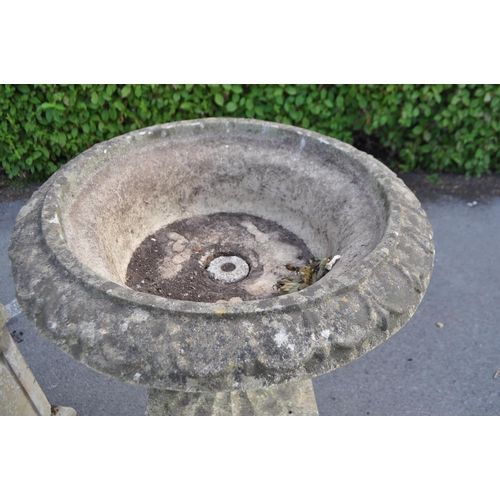 836 - A collection of three outdoor vintage 20th century reconstituted stone composite Campana garden urns... 