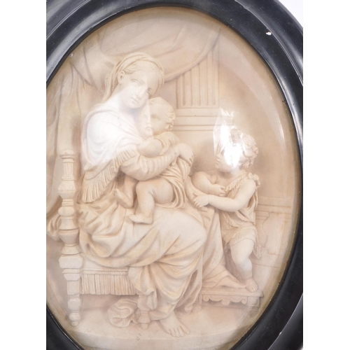 841 - The Virgin in the Chair - A 19th Century pipeclay relief plaque depicting religious scene of Mary ho... 