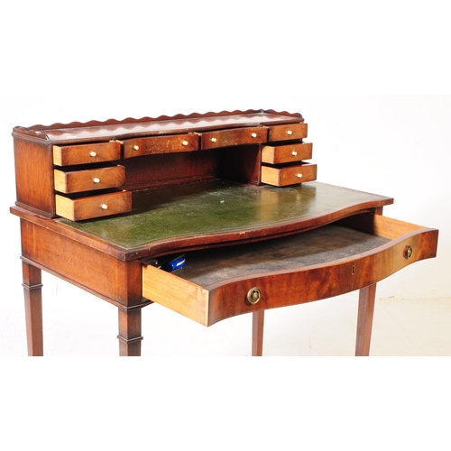 844 - Mahogany and leather ladies bonheur de jour writing table desk. Raised on tapering legs with serpent... 