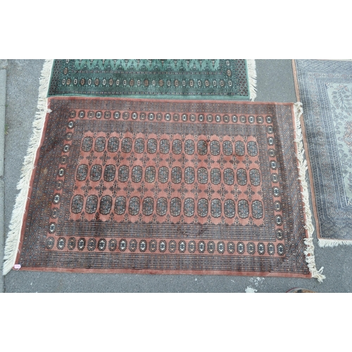 846 - A collection of five bokhara small proportioned Persian manner floor rugs. Each rug being of varied ... 