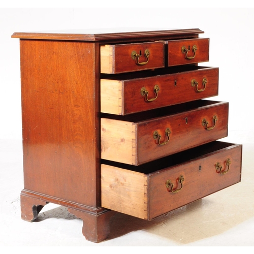 848 - A late 19th century Victorian mahogany bachelor's chest of drawers. The chest of drawers raised on b... 