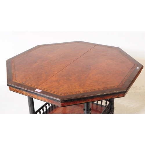 857 - A 19th century Victorian aesthetic movement octagonal occasional centre penny table. Having inlaid b... 