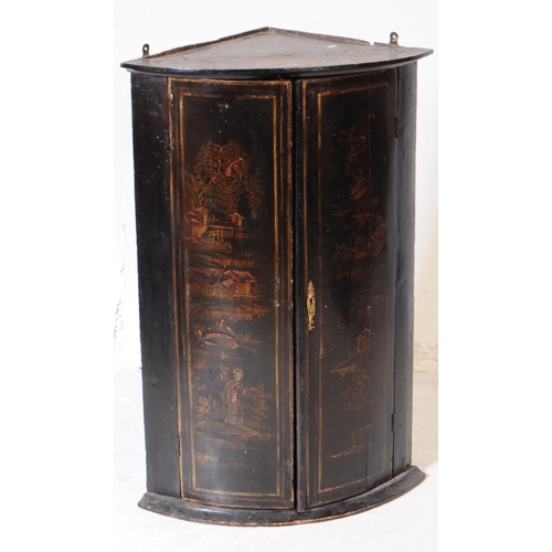 858 - Two 19th century George III chinoiserie wall corner cabinets. Twin curved door with shelved interior... 