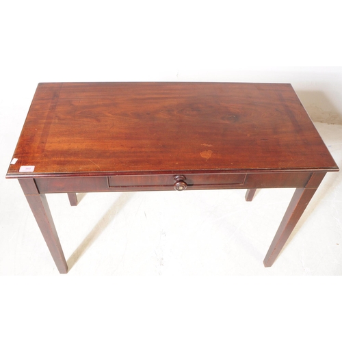 860 - A 19th century mahogany single drawer hall / side writing table. Of rectangular form with single sho... 