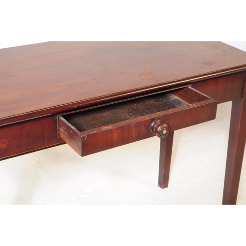 860 - A 19th century mahogany single drawer hall / side writing table. Of rectangular form with single sho... 