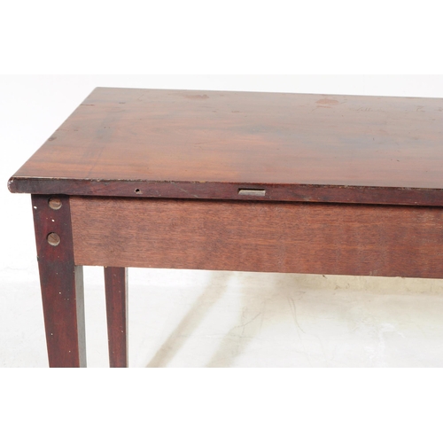 860 - A 19th century mahogany single drawer hall / side writing table. Of rectangular form with single sho... 