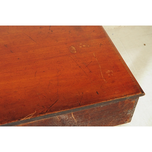 865 - A 19th century George III mahogany hall / writing table. Rectangular form with trestle supports term... 