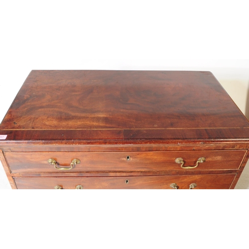 867 - A George III mahogany cross banded chest of drawers. Rectangular form with a bank of four full lengt... 