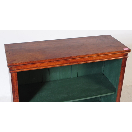 868 - A Victorian mahogany 19th century open face bookcase. Rectangular form with green painted shelved in... 