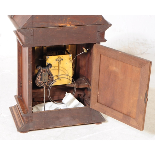 870 - An early 20th century circa 1930s English oak cased mantel clock with German movement striking on a ... 