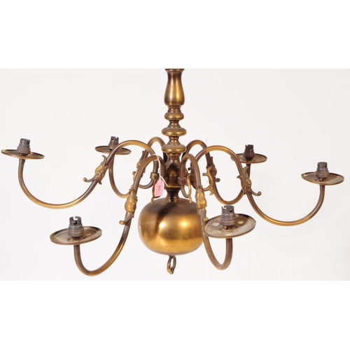 885 - An early 20th century Dutch six branch ceiling chandelier. With six curved arm, with fish motifs to ... 