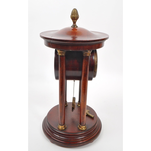 886 - A 19th century Victorian portico clock, being of stained walnut with acorn finial to top, white flor... 