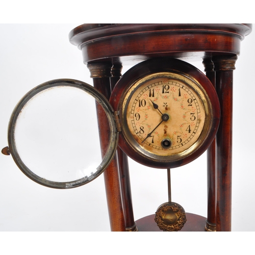 886 - A 19th century Victorian portico clock, being of stained walnut with acorn finial to top, white flor... 