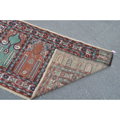 887 - A 20th century Turkish Kayseri / Saff manner Islamic prayer runner carpet rug. The rug featuring win... 