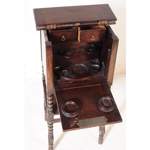 895 - A vintage early 20th century circa 1920s bobbin turned smokers / tobacco cabinet. Square form with h... 