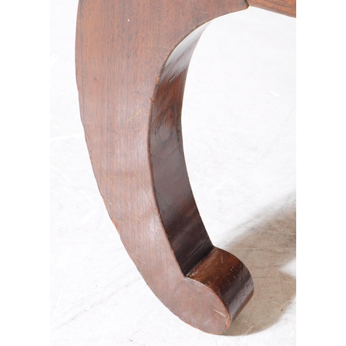 897 - A vintage 20th century hand carved Chinese camphor wood coffee table. Having curved pierced supports... 