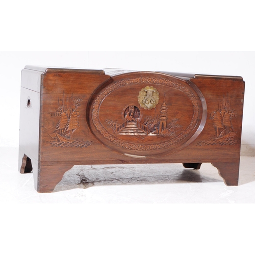 898 - A vintage 20th century oriental Chinese carved camphor wood blanket box. Rectangular form with carve... 