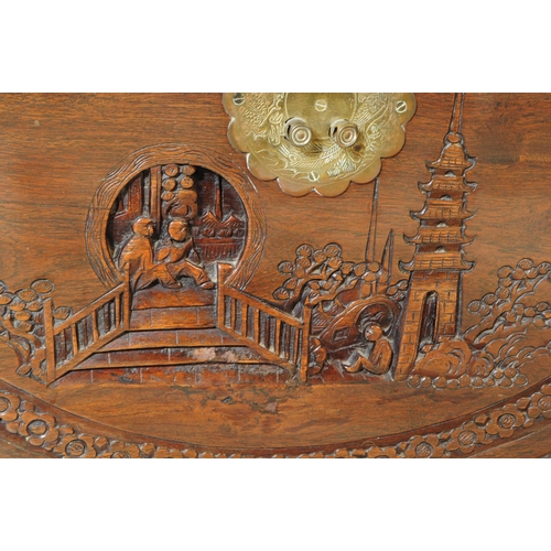 898 - A vintage 20th century oriental Chinese carved camphor wood blanket box. Rectangular form with carve... 