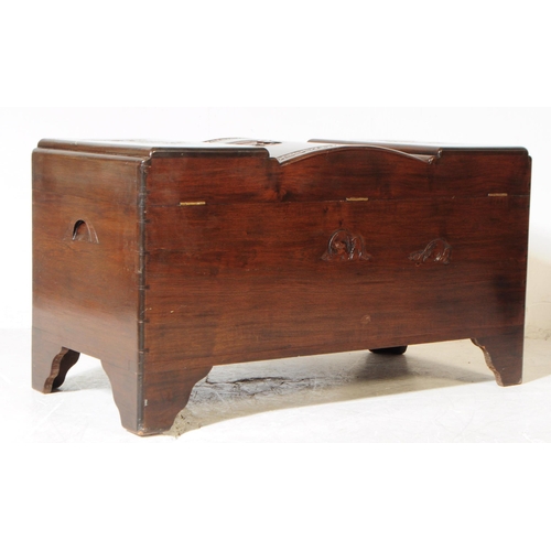 898 - A vintage 20th century oriental Chinese carved camphor wood blanket box. Rectangular form with carve... 