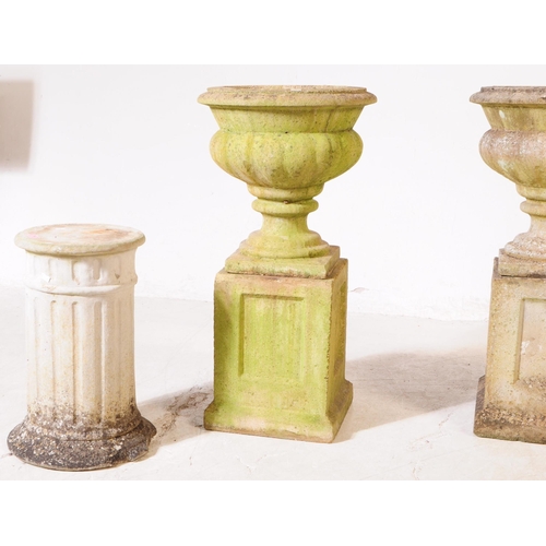 919 - A collection of three stone composite garden planters / jardinières. The collection to include a sin... 