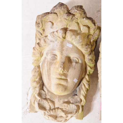 923 - Two stone architectural composite garden plaque bust faces. One plaque being in the form of Zeus, th... 