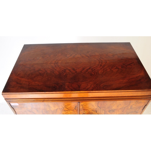 925 - An Art Deco circa 1930s figured burr walnut tallboy chest of drawers. Rectangular form with twin cab... 