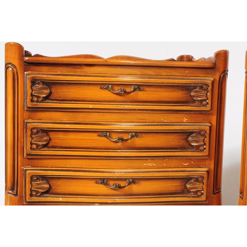 929 - A pair of French Louis XVI revival walnut bedside tables / chests of drawers. The chests of drawers ... 