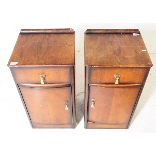 931 - A pair of mid 20th century Post War Art Deco oak veneer pot cupboards / bedside tables. The bedsides... 