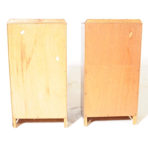 931 - A pair of mid 20th century Post War Art Deco oak veneer pot cupboards / bedside tables. The bedsides... 