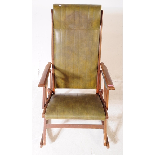 933 - A19th century steamer / deck style oak wood folding rocking chair. The chair featuring green leather... 