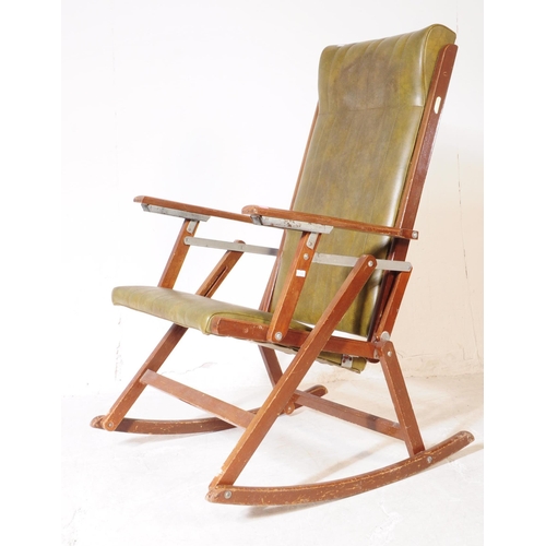 933 - A19th century steamer / deck style oak wood folding rocking chair. The chair featuring green leather... 