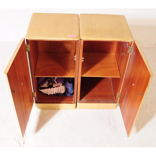 934 - A pair of mid 20th century Queen Anne Revival bedside cabinet / pot cupboards. The bedsides raised o... 