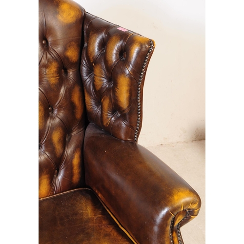 935 - Chesterfield style - A 20th Century yellow leather Chesterfield manner wingback two seater sofa love... 