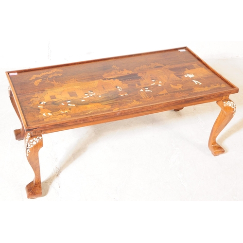 943 - A 20th century Indian bone inlaid coffee / side table. The table raised on short cabriole legs, with... 