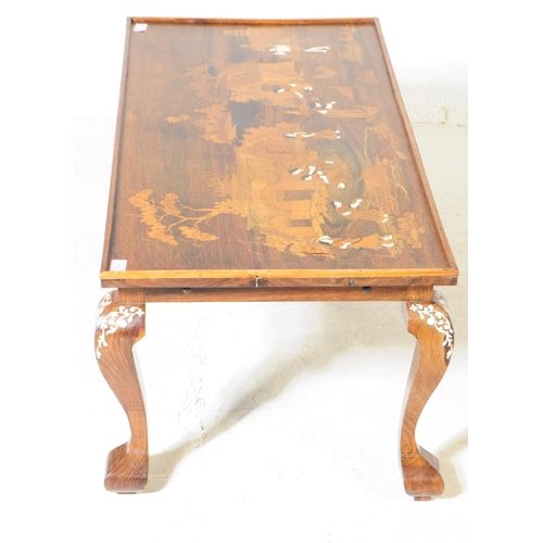 943 - A 20th century Indian bone inlaid coffee / side table. The table raised on short cabriole legs, with... 