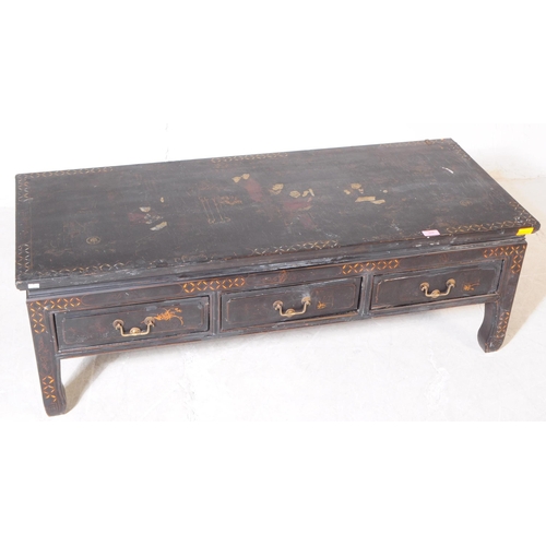 944 - A 20th century Chinese low inlaid ebonised black lacquered chinoiserie coffee / tea table. The table... 