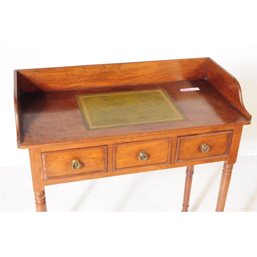 958 - A 19th century Victorian mahogany writing desk / hall table. Raised on turned tapered legs on rounde... 