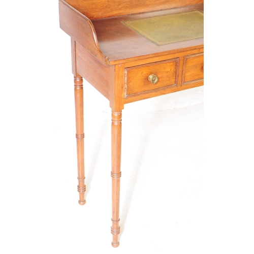 958 - A 19th century Victorian mahogany writing desk / hall table. Raised on turned tapered legs on rounde... 