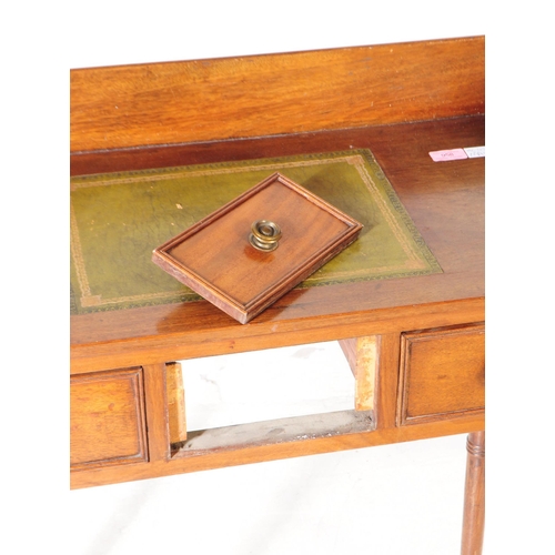 958 - A 19th century Victorian mahogany writing desk / hall table. Raised on turned tapered legs on rounde... 