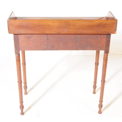 958 - A 19th century Victorian mahogany writing desk / hall table. Raised on turned tapered legs on rounde... 