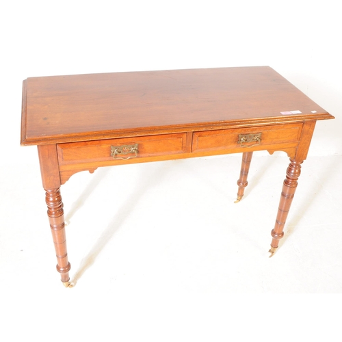 962 - A 19th century Victorian mahogany writing desk / console hall table. The table raised on tapered tur... 