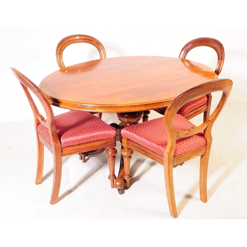 985 - A late 19th century Victorian mahogany tilt top dining loo table and four dining chairs. The table r... 