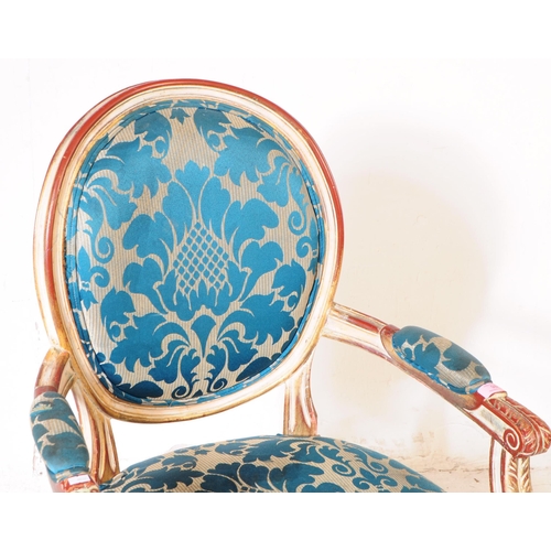 986 - A Louis XVI manner giltwood salon armchair. The chair raised on tapered fluted legs to front, having... 