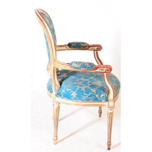 986 - A Louis XVI manner giltwood salon armchair. The chair raised on tapered fluted legs to front, having... 