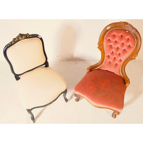 996 - A 19th century Victorian walnut ladies spoon back nursing chair, alongside another. The chair having... 