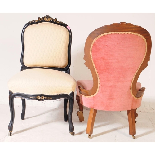 996 - A 19th century Victorian walnut ladies spoon back nursing chair, alongside another. The chair having... 